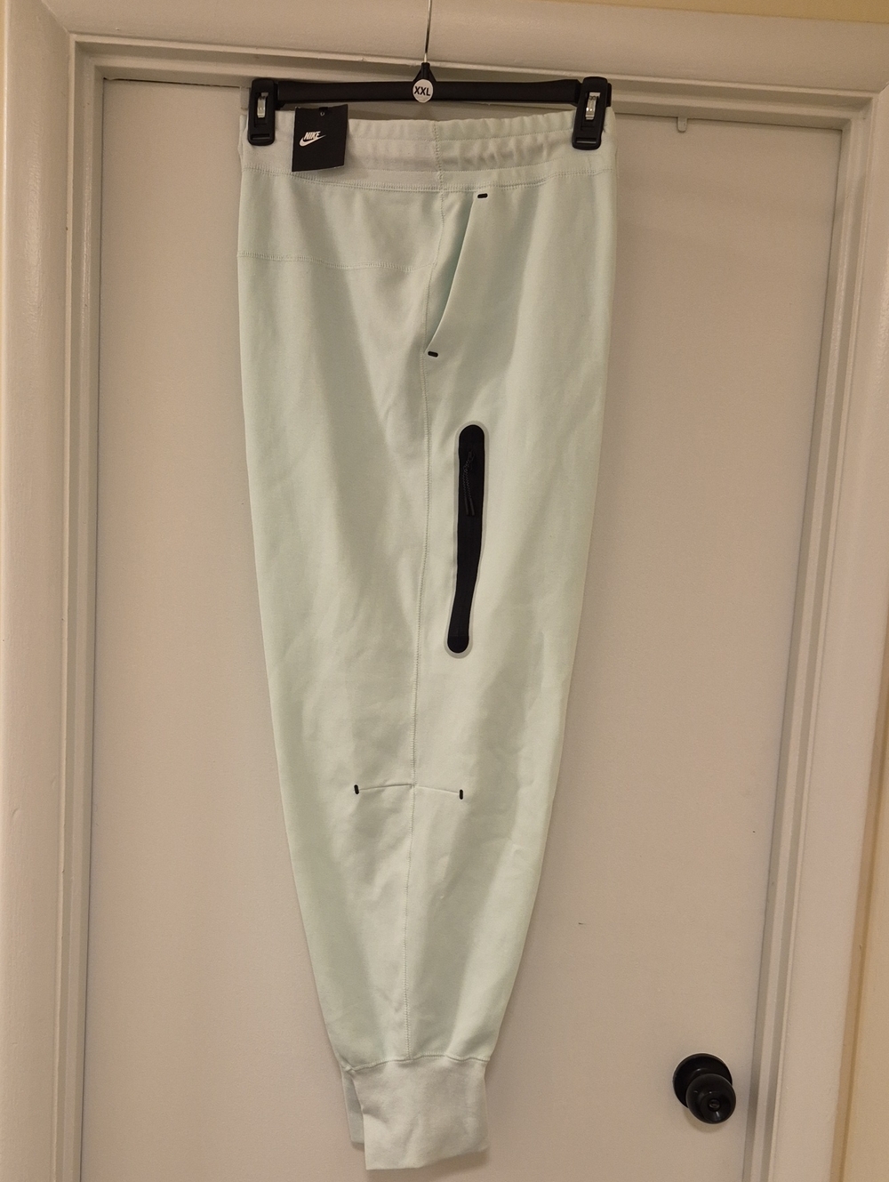 Nike Men’s Mint Green Jogger Pants with Black Zipper Accent
